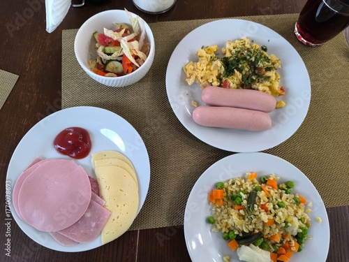 morning breakfast with boiled sausages and omelette. healthy eating concept