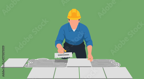 Tiler applying adhesive to tiles with notched trowel.