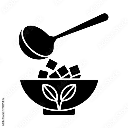 a simple black and white icon of sugar cubes falling into a bowl with a plant design and a spoon above