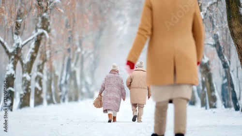 Healthy centenarian elderly winter walk snow park gentle companionship family support serene mood elderly couple walking snowy
