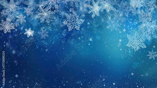 Blue Christmas background with snowflakes and wintry theme