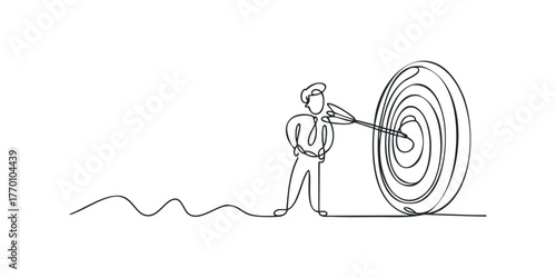 Man throwing darts at target board