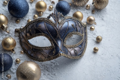 Venetian carnival mask with festive blue gold ornaments
