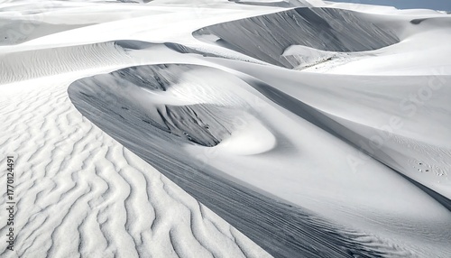 Fototapeta Naklejka Na Ścianę i Meble -  Expansive desert landscape with rolling, pristine white dunes
