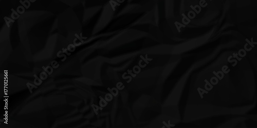 Crumple crushed black paper obsolete rumple craft design. wrinkle ripped creased crumple aged closeup recycled document grunge paper background.	
