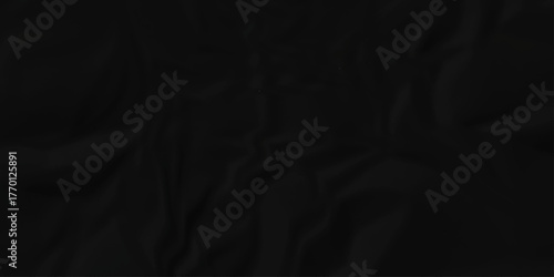 Crumple crushed black paper obsolete rumple craft design. wrinkle ripped creased crumple aged closeup recycled document grunge paper background.	