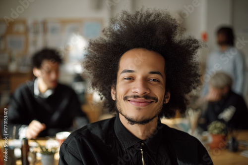 Young afro man studying at class