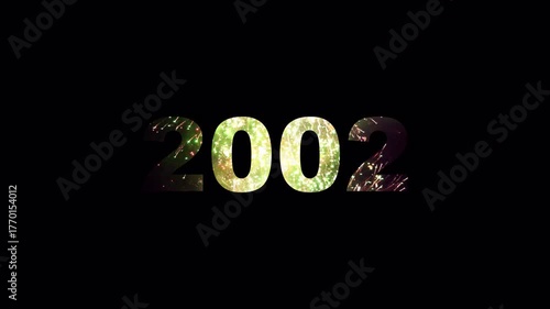 Countdown of numbers from 2000 to 2026 masking fireworks