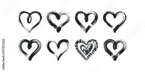 Collection of eight hand-drawn black hearts with brush stroke texture