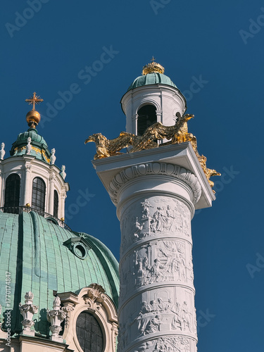 Karlskirche church baroque column sculpture against blue sky