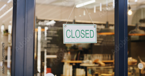 Tableau sur toile Closed sign, empty and entrance of restaurant with window, done and door poster for end of day