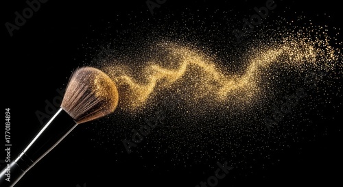 Makeup Brush and Golden Powder - A makeup brush with a cloud of golden powder flowing from it, set against a solid black background