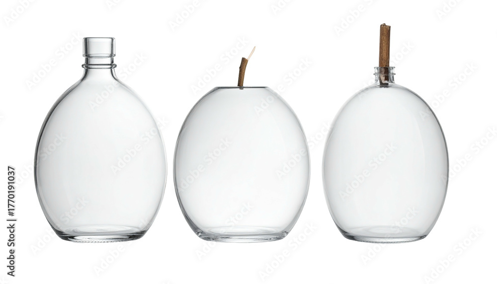 Fototapeta premium Three clear glass bottles/vessels, different shapes