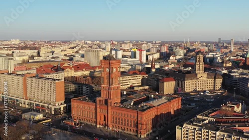 Wallpaper Mural Aerial view of the striking red brick Rotes Rathaus contrasting against the urban cityscape with a clear blue sky, Berlin, Berlin, Germany. Torontodigital.ca