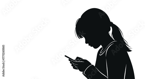 Silhouette of a young person with a ponytail, head down and intently focused on a smartphone, representing mobile device usage.