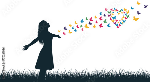 A silhouette of a woman releasing a flock of colorful butterflies, symbolizing freedom and joy.