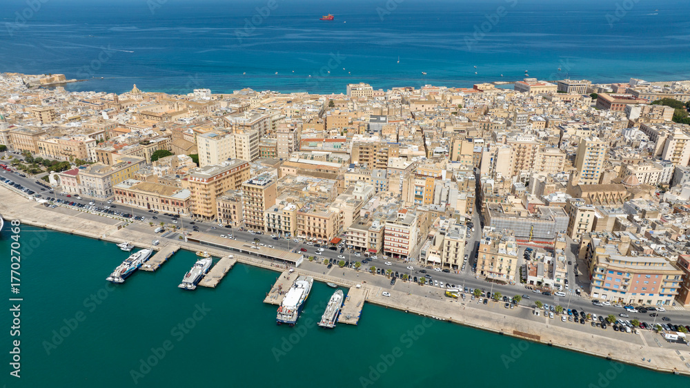 Fototapeta premium Aerial view of the peninsula where the city of Trapani is located, in Sicily, Italy. It is a beautiful city overlooking the Mediterranean Sea.