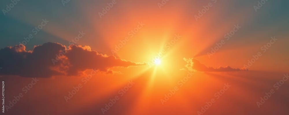 Fototapeta premium Vibrant orange sunburst, glowing light flares in a clear sky , intense, hot