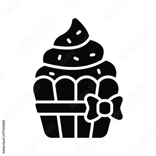 An editable icon of cupcake designed in glyph style