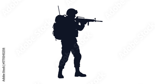A lone soldier in silhouette holding a rifle and wearing a backpack in a defensive stance silhouette