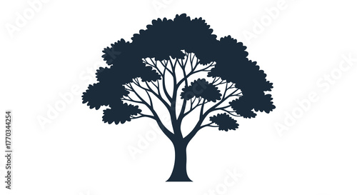 A majestic deciduous tree with a full canopy and intricate branching pattern rendered in a striking dark silhouette