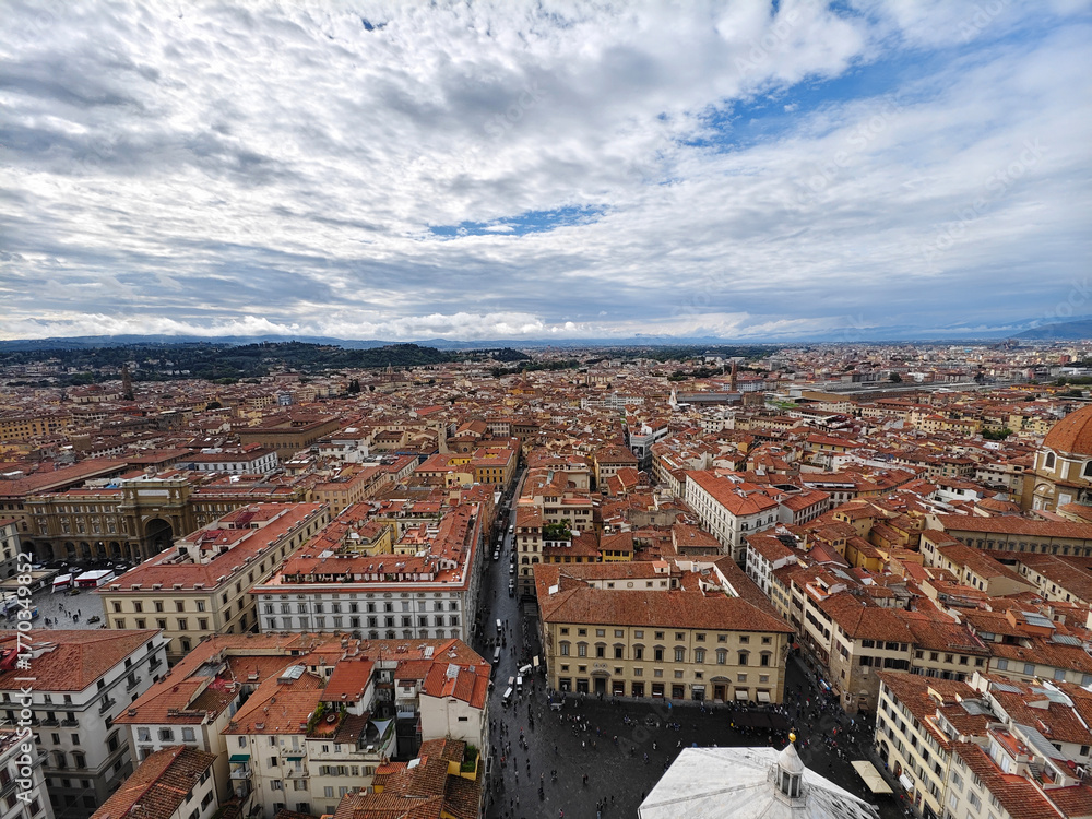 Fototapeta premium High angle view of Florence old town with red rooftops and city streets