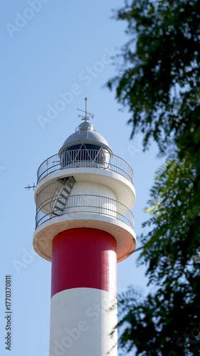 Video of the top of the famous El Rompido lighthouse on the coast of Huelva. 4k. 50 fps. vertical video