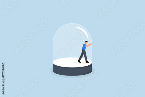 Business constraints, businessman within the glass makes strong effort to shatter limitations.