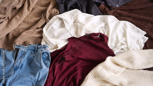 The top view of the autumn women's capsule wardrobe lies on the floor.