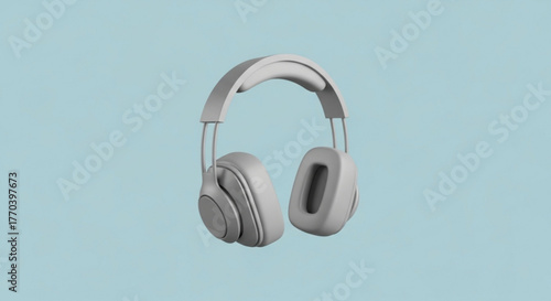 Studio shot of wireless headphones on blue background, a device used for listening to music, podcasts, and audio content in comfort