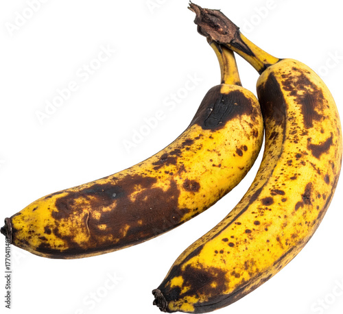 Overripe spotted bananas with brown spots isolated on white background food waste