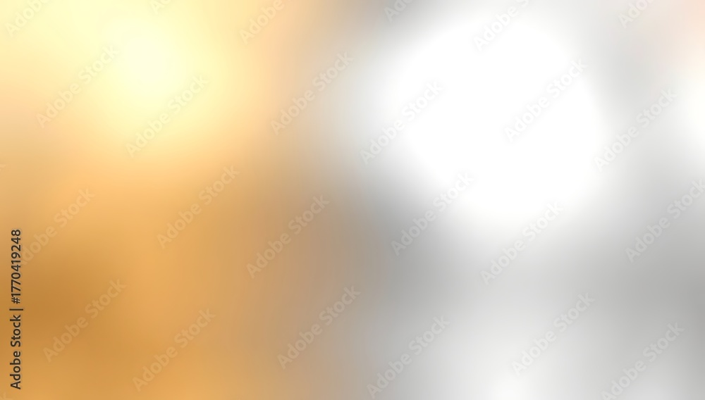 Obraz premium Abstract blurred background with golden and silver colors, creating a soft and luminous effect.