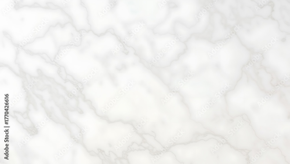 Fototapeta premium A close-up abstract view of a white marble surface with subtle gray veining.