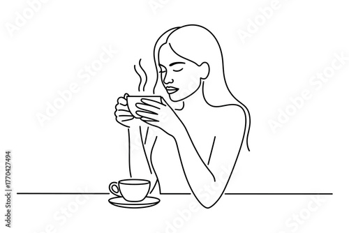 A woman enjoys a warm cup of coffee, embracing a moment of quiet reflection and comfort.