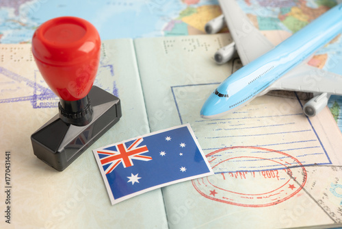 Australia flag with passport and airplane for travel.