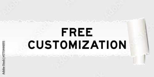 Ripped gray paper background that have word free customization under torn part