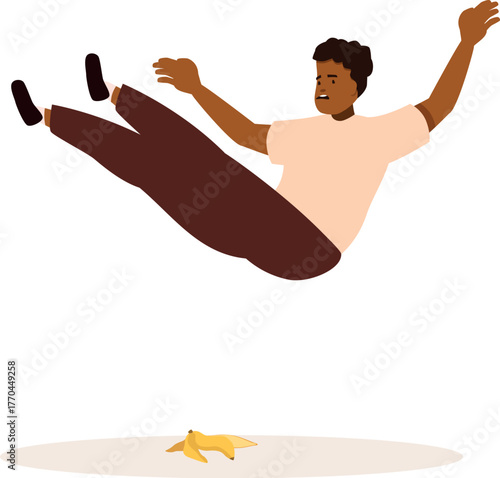 Young man falling after slipping on a banana peel, representing accidents, clumsiness, and unexpected falls