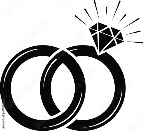 Two interlocking wedding rings with a diamond