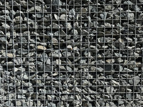Gabion, texture, background. Gabion net frequent part (design). New technologies in the manufacture of retaining walls and fences. Landscaping. Fencing decorative elements