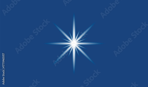 Bright white starburst sparkle effect on deep blue background