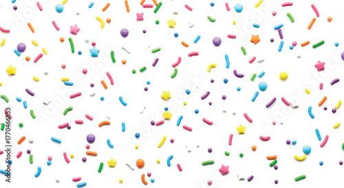 Festive Colorful Sprinkles Scatter Stars, Balls, and Rods on White Backdrop