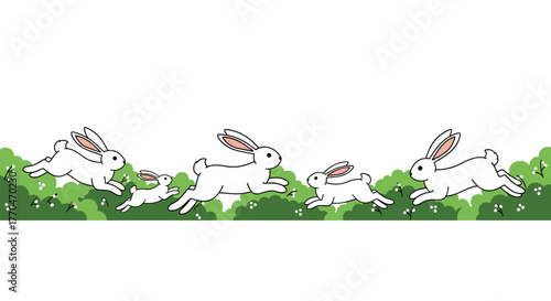 A lively group of white rabbits, including adults and young, joyfully hopping through green grass with small white flowers.