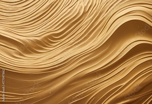 Golden desert sands: abstract wind-sculpted dunes and ripple patterns in warm light