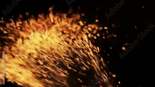Sparks flying against a dark background.