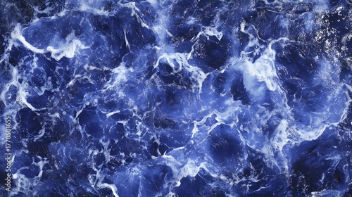 Captivating abstract background featuring a swirling fluid marble texture in vivid shades of blue and navy  Flowing dynamic visual with a aesthetic perfect for digital art branding