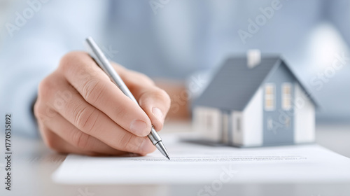 Real estate investment and mortgage planning strategies office document signing indoor environment close-up viewpoint