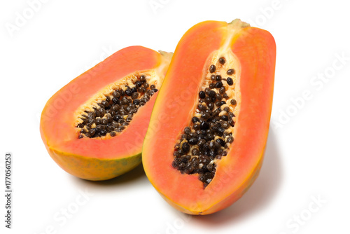 Ripe papaya cut in half to reveal the juicy flesh and seeds. isolated on white background.