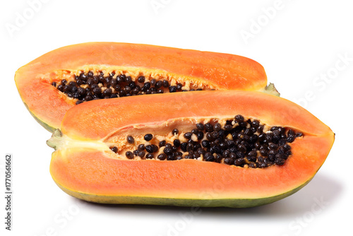 Ripe papaya cut in half to reveal the juicy flesh and seeds. isolated on white background.
