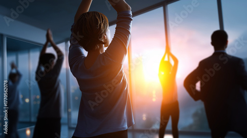 Faceless coworkers taking a five-minute wellness break, silhouettes visible through soft light haze, promoting workplace balance, with copy space.