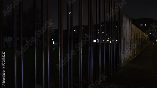 Path illumination, Path view, Memorial lights. Path and surroundings Berlin Wall Memorial illuminated by dim streetlights during night.
